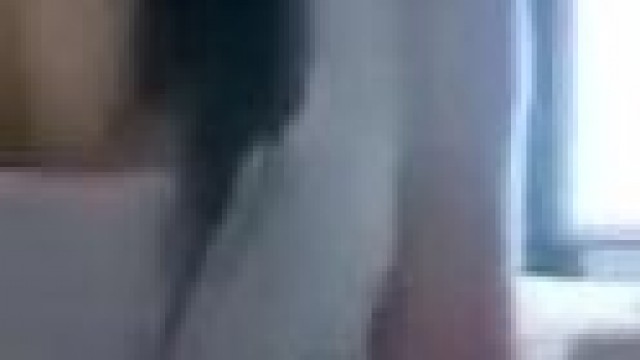 Brunette – She masturbates with clothes on