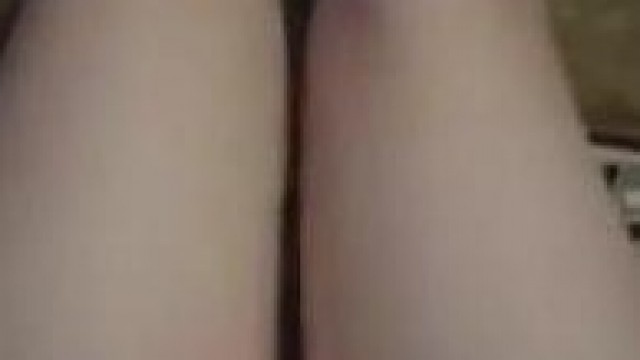 Brunette – She reveals her hairy pussy