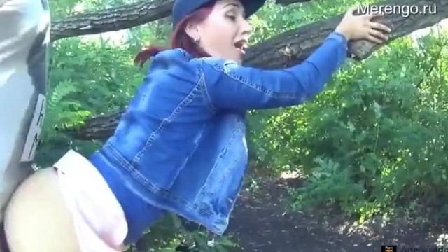 Pantyless redhead fucked in the wild