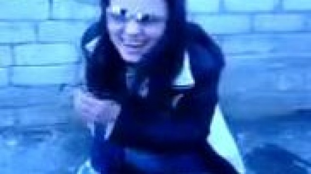 pissing – Nasty brunette pisses outdoors